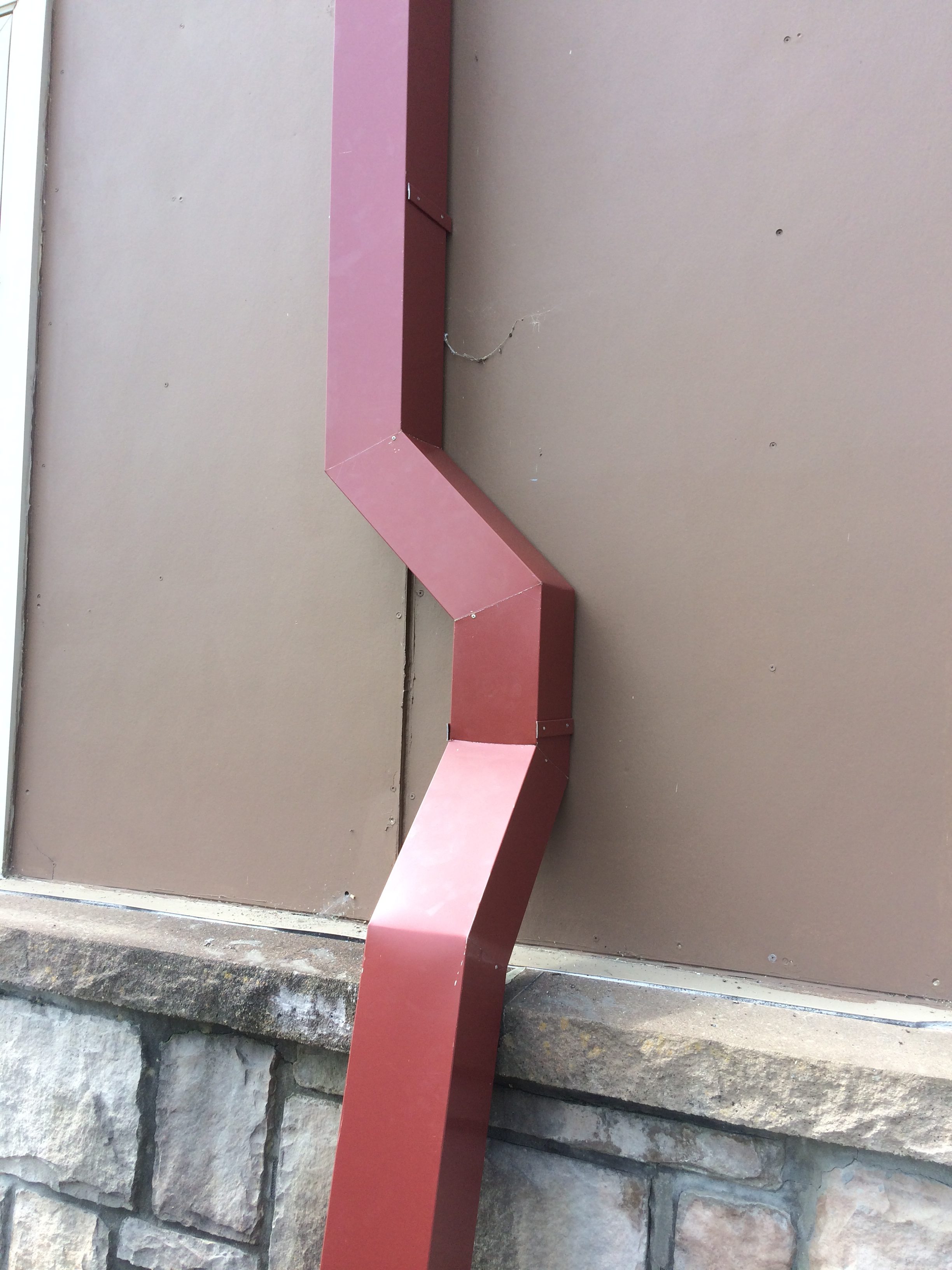 Double offset in downspout